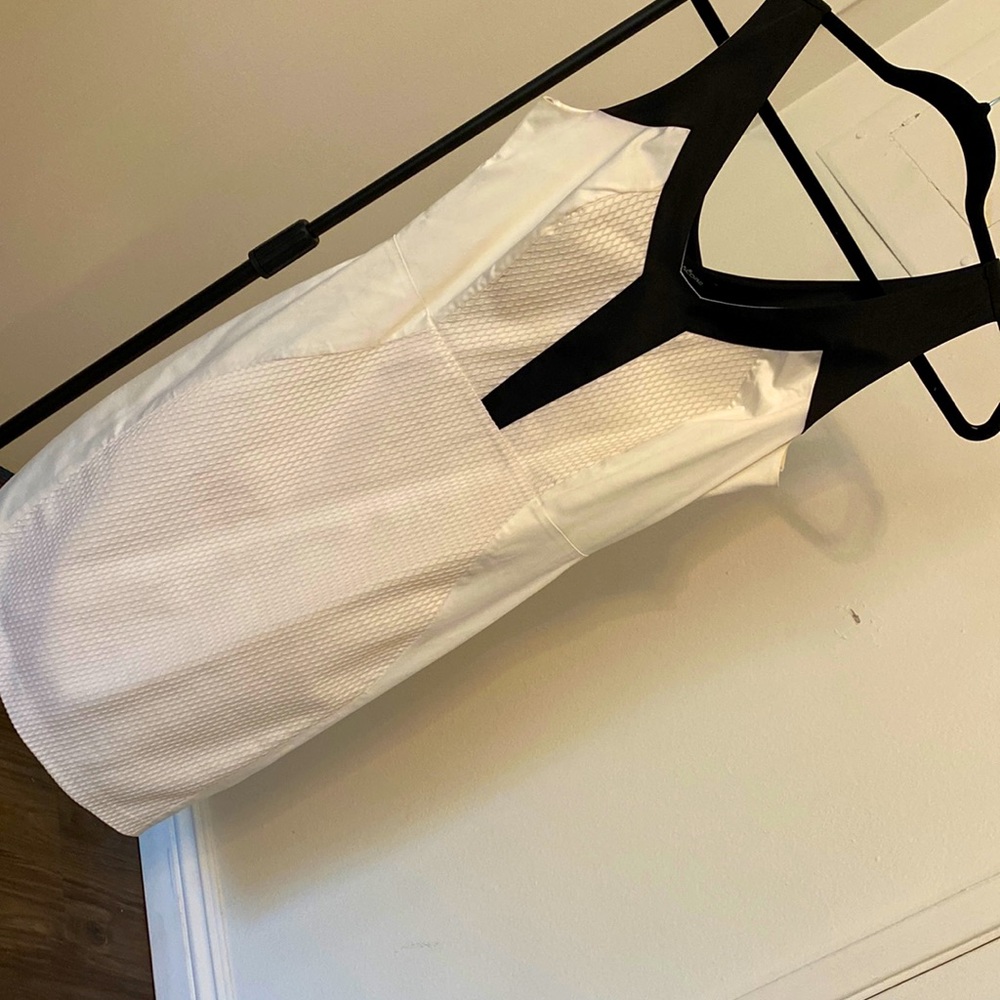 LARGE WHITE DRESS . Zip on the side . In a Very good conditions